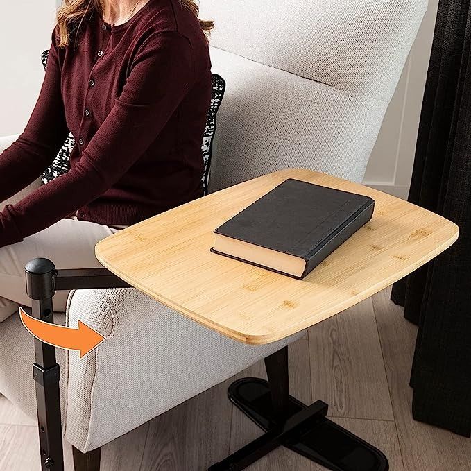 Adjustable outlet swivel table