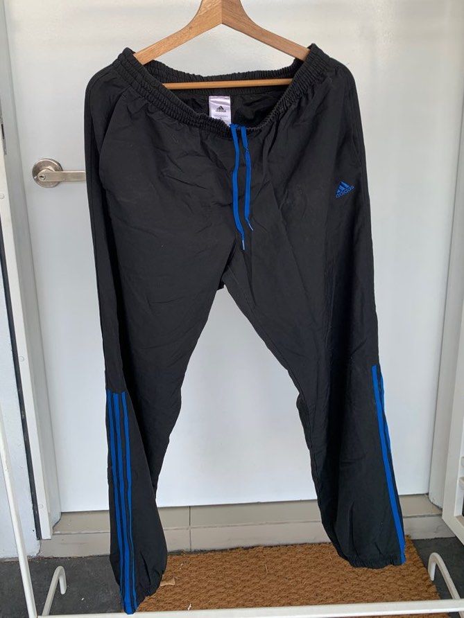 Black adidas pants deals blue stripes