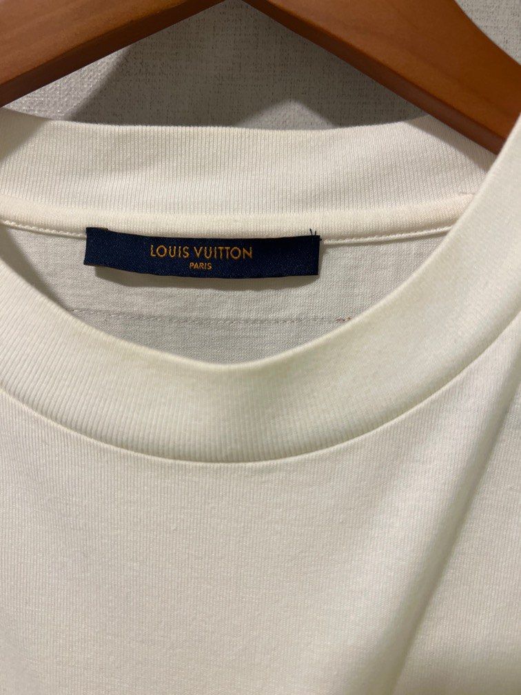 Shop Louis Vuitton Embossed lv t-shirt by Bellaris