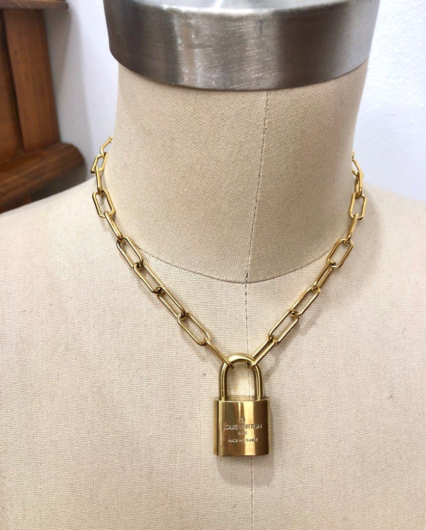 Louis Vuitton - Authentic Brass Padlock Necklace