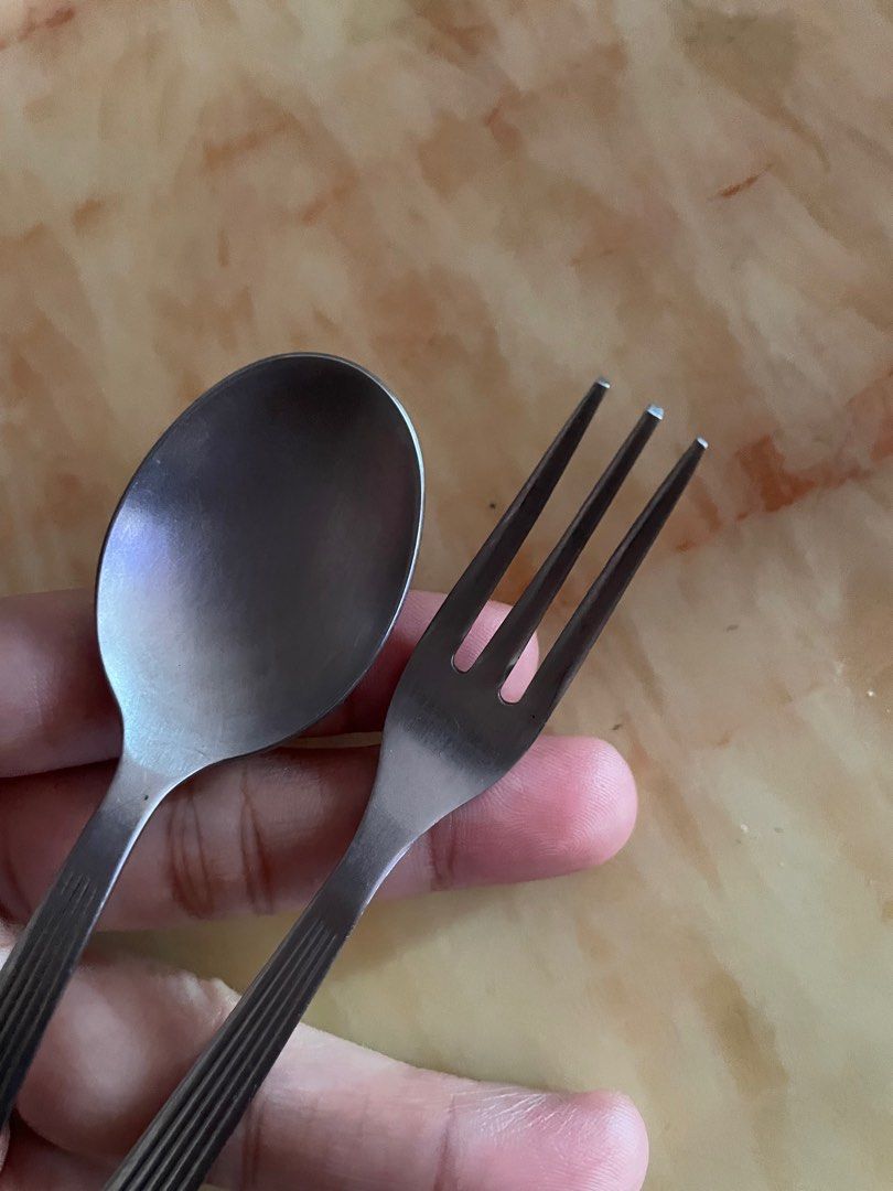 Givenchy tea spoon and tea fork set (Category: Dinnerware & Cutlery) located in Manila. Submitted by aneajmik (Listing ID 1236825641, Image 3). Description: Can be use as cocktail and dessert utensils too. Original! Well loved! Signs of usage but still looks nice! Authentic Givenchy stainless steel..