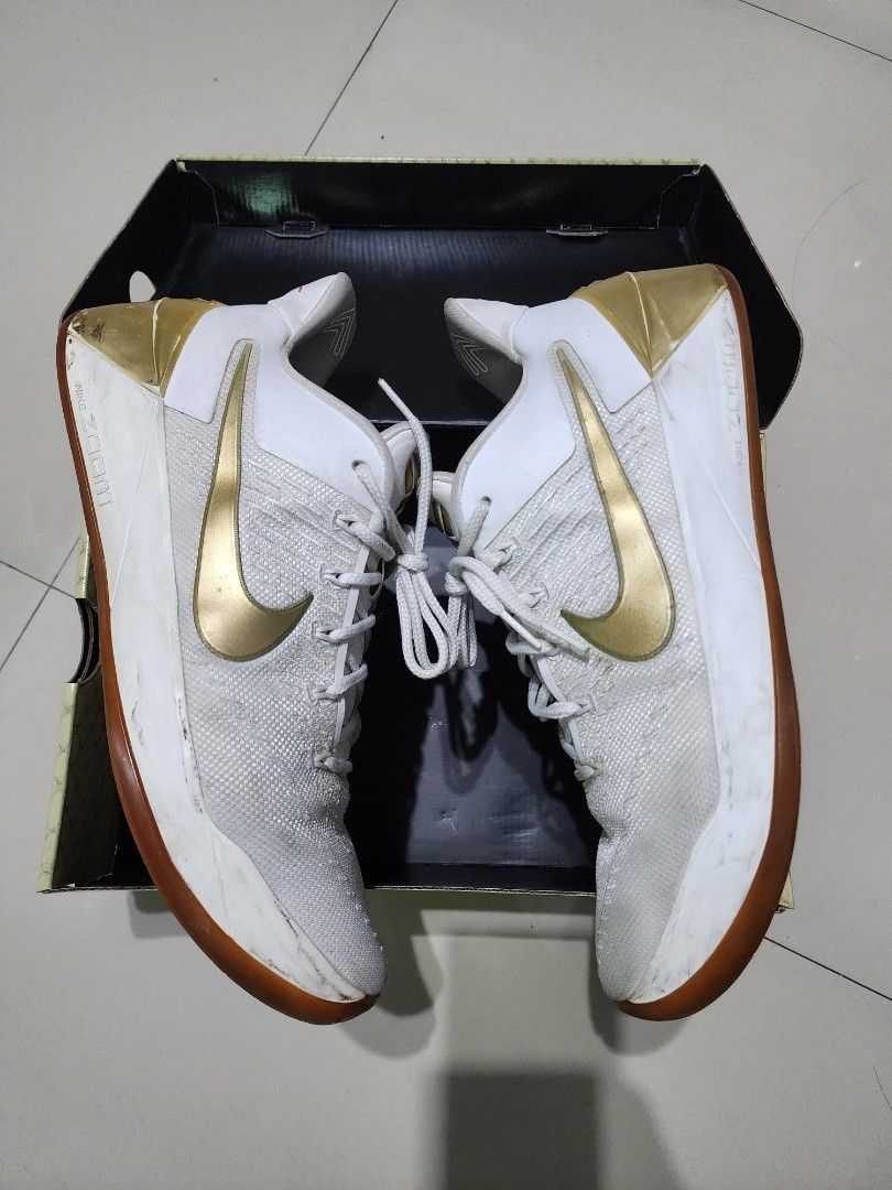 Kobe ad white and gold top
