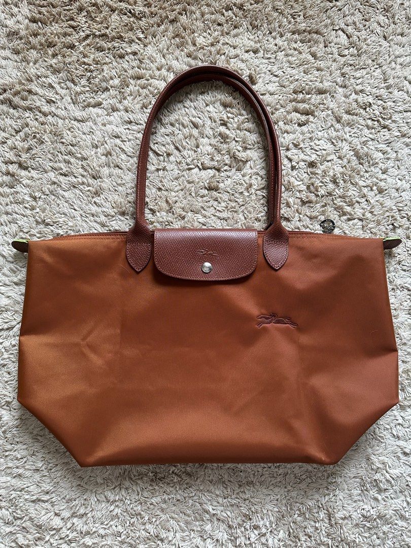 New Longchamp Le Pliage Green Pouch (Cognac/Brown), Women's Fashion, Bags &  Wallets, Purses & Pouches on Carousell