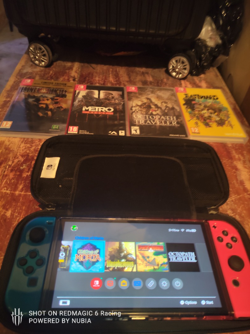 Nintendo switch oled + games bundle, Video Gaming, Video Game Consoles, Nintendo on Carousell