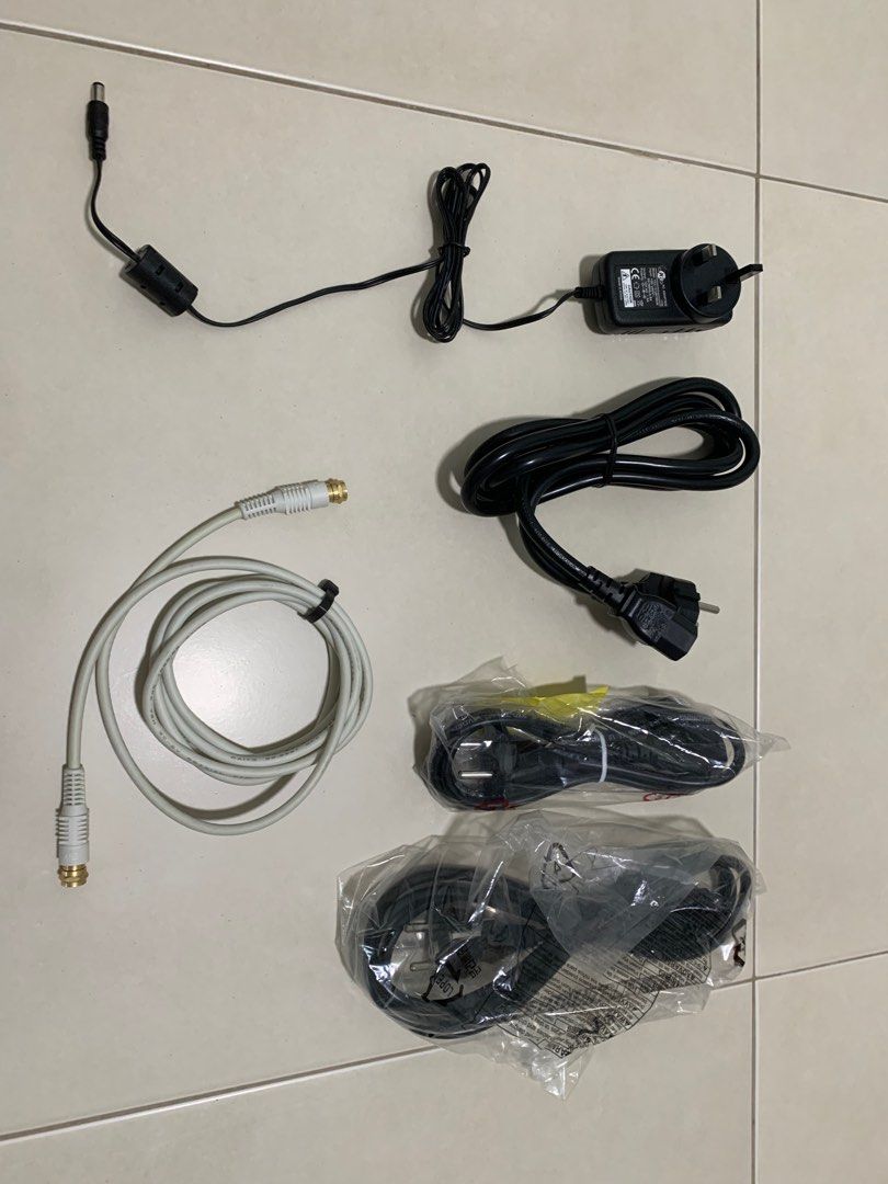 Assorted cables (Category: Other Home Appliances) located in Singapore. Submitted by tej00 (Listing ID 1236802393, Image 1). Description: Take all for $5. Each $1. Power cables x3 Coaxial cable x1 AC adapter 12V 1.5A x1.