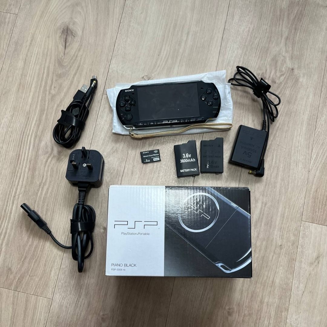 SONY PSP Go Playstation Portable console, manual, battery cable