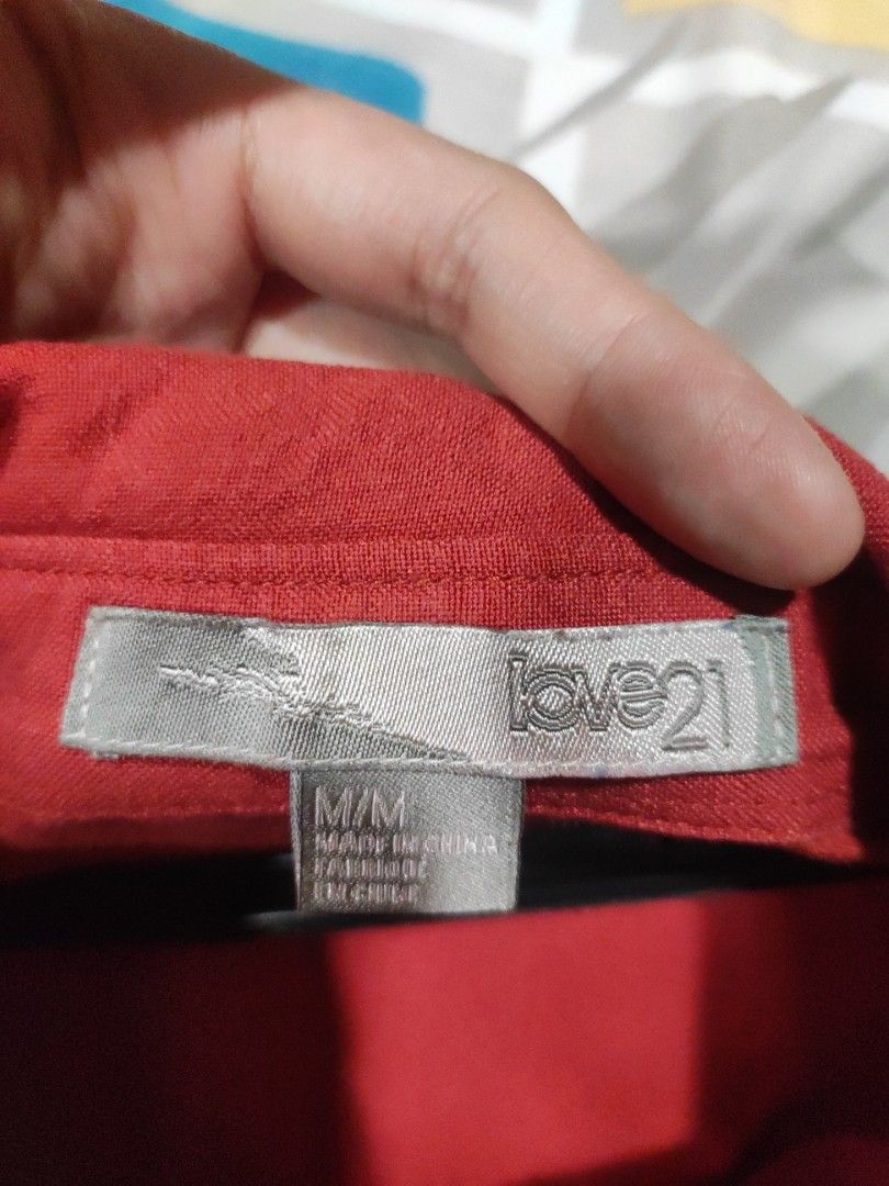 Forever 21- Red Orange long sleeve blouse (Category: Longsleeves) located in San Juan City. Submitted by _rian (Listing ID 1236941964, Image 3). Description: Used a few times. Most of the time stored in cabinet. Medium size Has a long and slim fit..