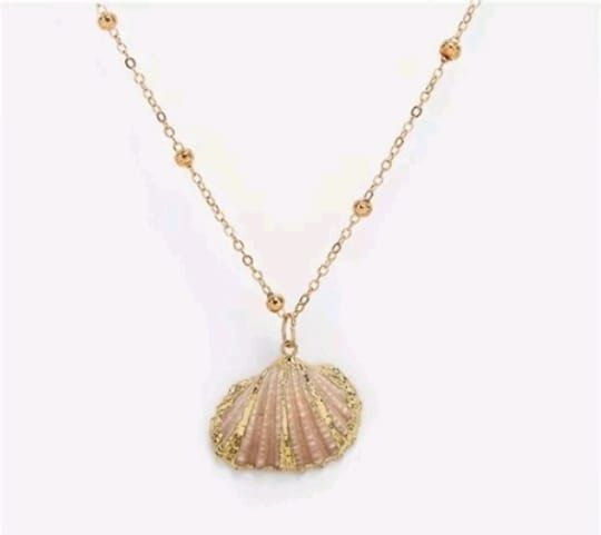 Gold seashell necklace on sale
