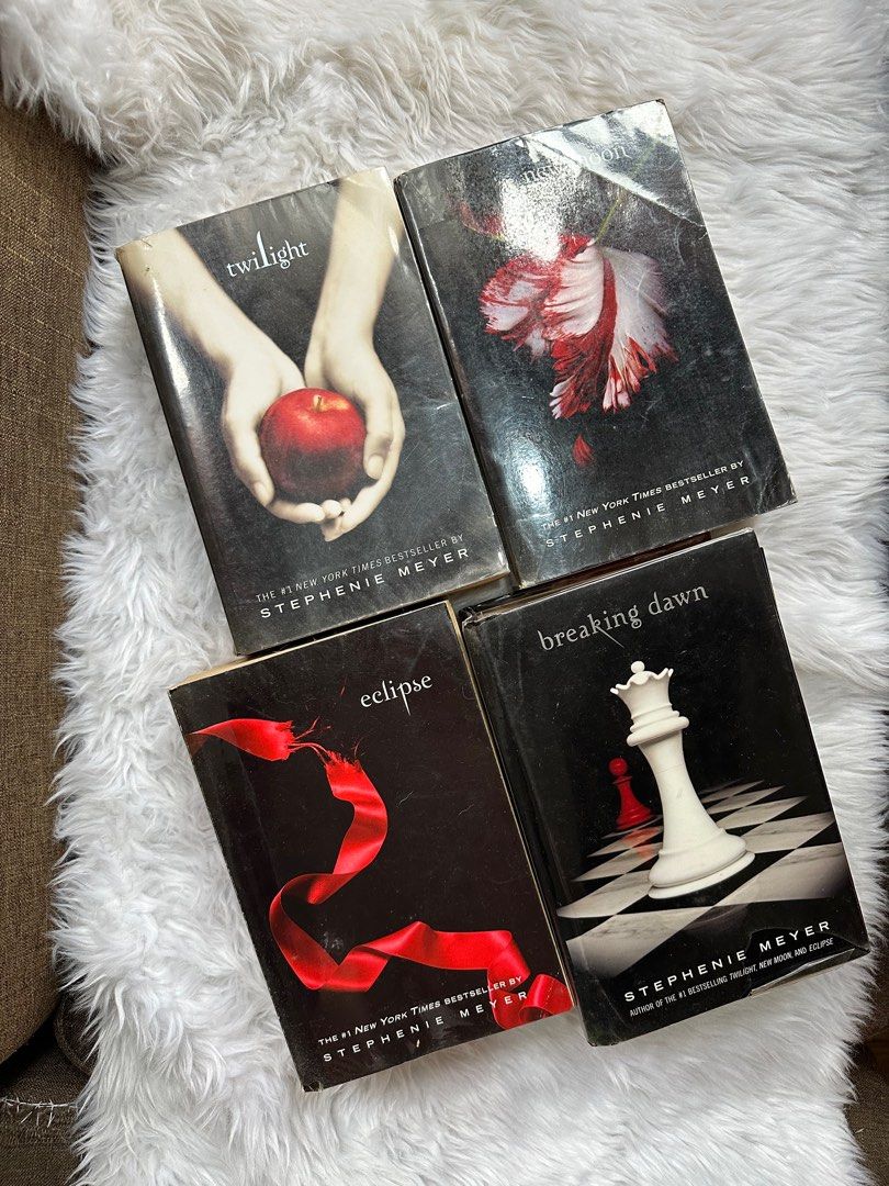 Twilight saga book set (Category: Storybooks) located in Cainta. Submitted by abivc (Listing ID 1236806019, Image 2). Description: Twilight saga complete set! - well loved. However brown pages due to storage na (I personally like brown pages though) - breaking dawn hardbound - All fully covered in plastic cover Please refer to photos. Thank you! .