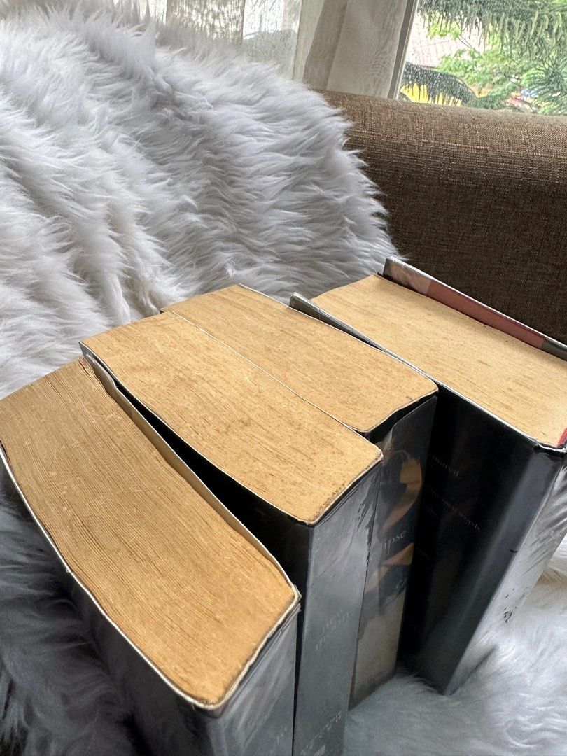 Twilight saga book set (Category: Storybooks) located in Cainta. Submitted by abivc (Listing ID 1236806019, Image 3). Description: Twilight saga complete set! - well loved. However brown pages due to storage na (I personally like brown pages though) - breaking dawn hardbound - All fully covered in plastic cover Please refer to photos. Thank you! .