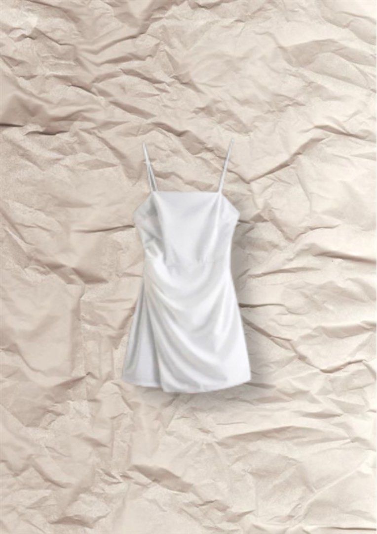 White Slim String Formal Dress (Category: Dresses) located in Mandaluyong City. Submitted by nami.declutters (Listing ID 1236929872, Image 1). Description: — used once — small, can fit up to semi medium frame — above knee length — dm for when worn — mop: gcash/maya/bpi — loc: cavite/mm.