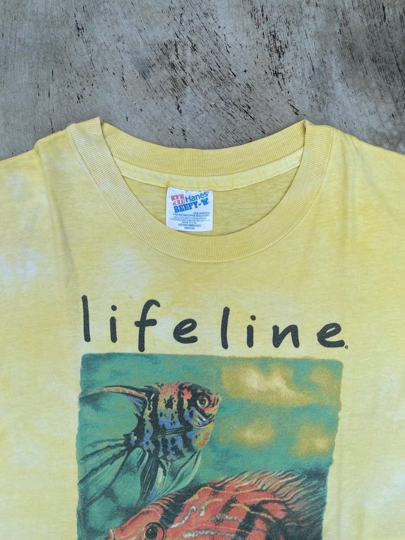 90s Lifeline Tee (Category: Tshirts & Polo Shirts ) located in Calamba. Submitted by pyrex_13 (Listing ID 1236986256, Image 3). Description: 90s vintage Hanes made in USA 500 shipped dyed it yellow width: 19” length: 26.5”.