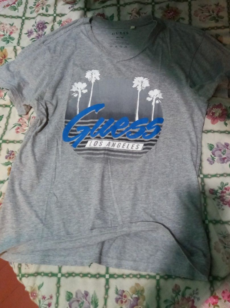 Authentic Guess USA Tee Shirt (Category: Tshirts & Polo Shirts ) located in Marilao. Submitted by MusicAndThings (Listing ID 1237081818, Image 1). Description: Vintage Print Design Style (Rubberised) Guess Tee Size Medium W19×L25 Slim Fit Fits up to Large.