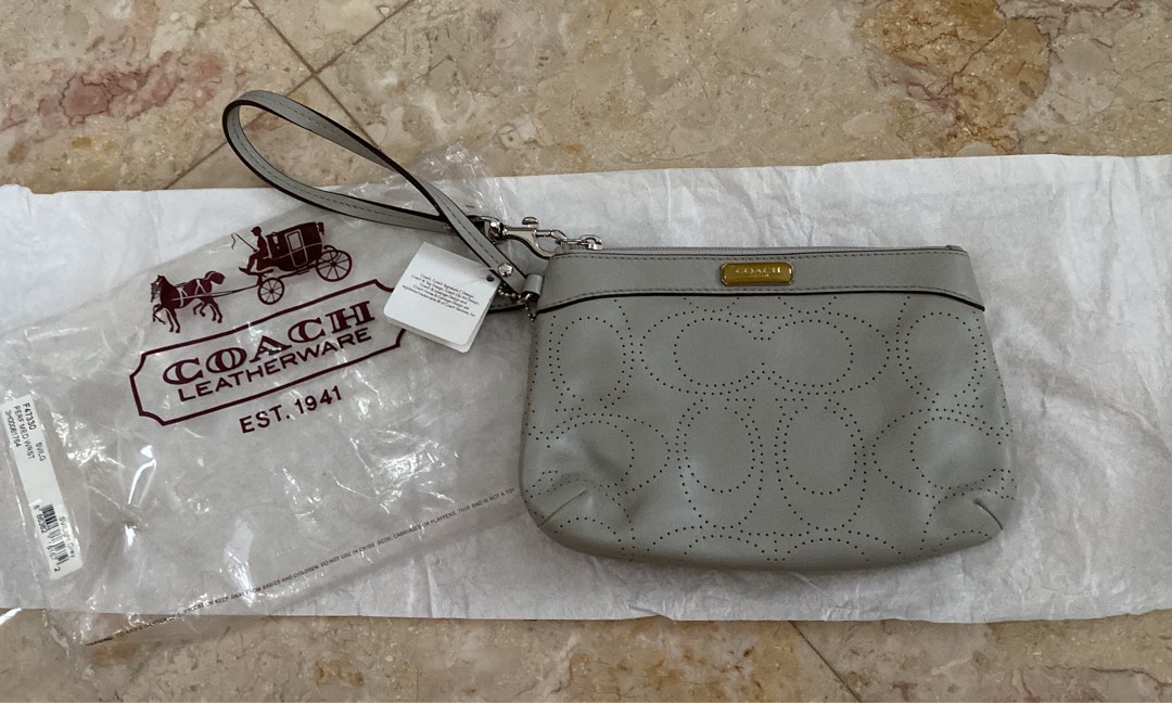 Coach Perforated Wristlet Silver/Grey Leather Signature C Clutch, Luxury,  Bags u0026 Wallets on Carousell