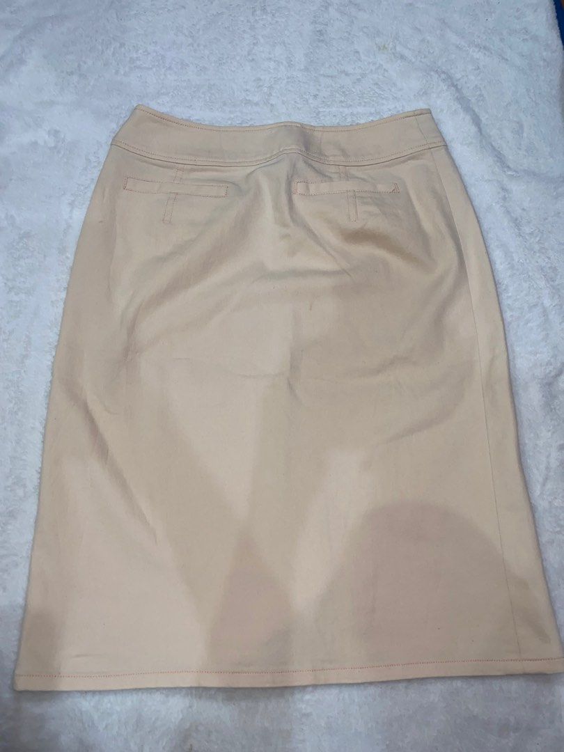 Denim cream colored pencil skirt (Category: Skirts) located in Navotas City. Submitted by uranium_235 (Listing ID 1237095482, Image 2). Description: Denim Cream or pale salmon pink in actual With zipper on the side Waistline: 24.5 or 25 inches .