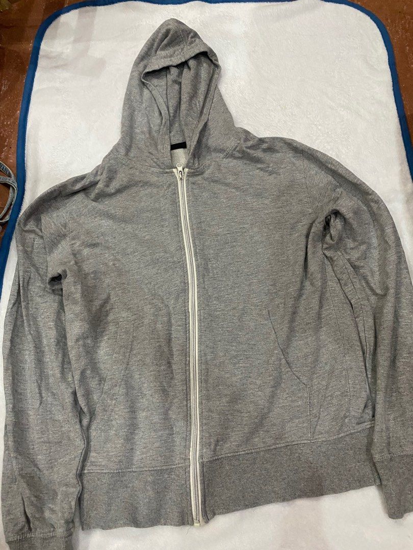Gray jacket with hoodie (Category: Coats, Jackets and Outerwear) located in Navotas City. Submitted by uranium_235 (Listing ID 1237093292, Image 3). Description: In good condition Cotton With hoodie Size: m-l .
