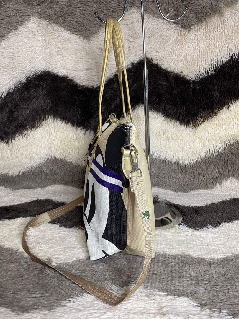 Pochette best sale lacoste mickey
