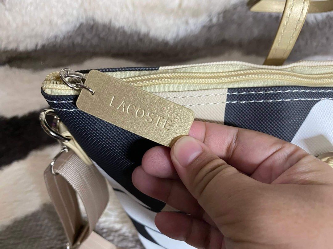 Pochette 2025 lacoste mickey