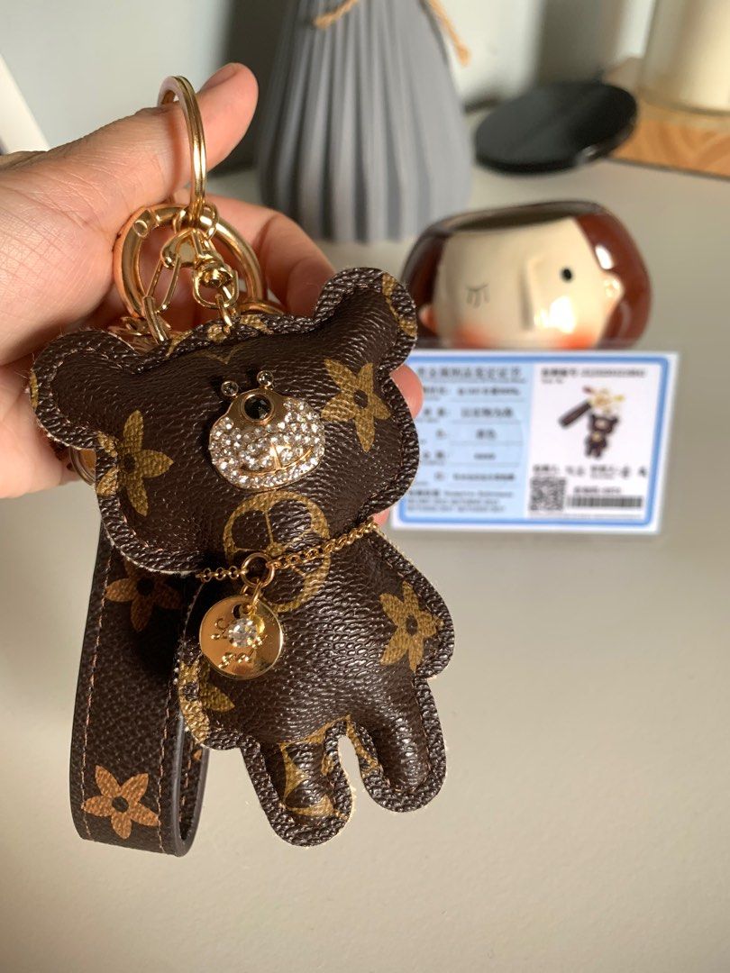 L V bear key chain with 24k gold (comes with paper bag na po) 650