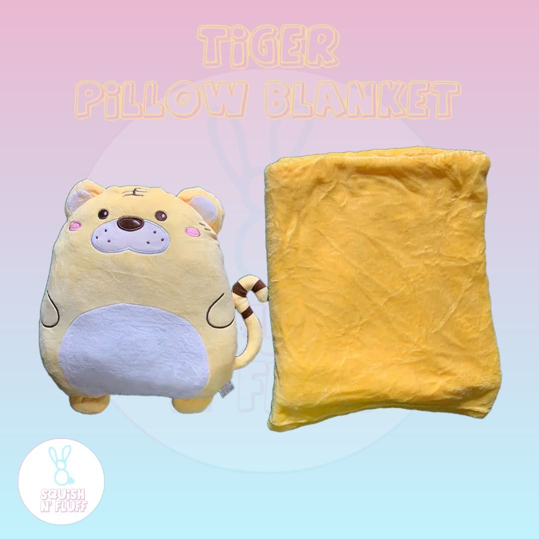 Pillow Blanket (Category: Children's Beds) located in Marikina City. Submitted by rtobs08 (Listing ID 1187603736, Image 3). Description: Bear pillow with blanket inside, also has arm holes to prevent your hands from getting cold. Soft and cuddly fabric. With arm holes 699 Shiba Bear Pink Bunny Without arm holes 599 Tiger Lion Bear Dinosaur.