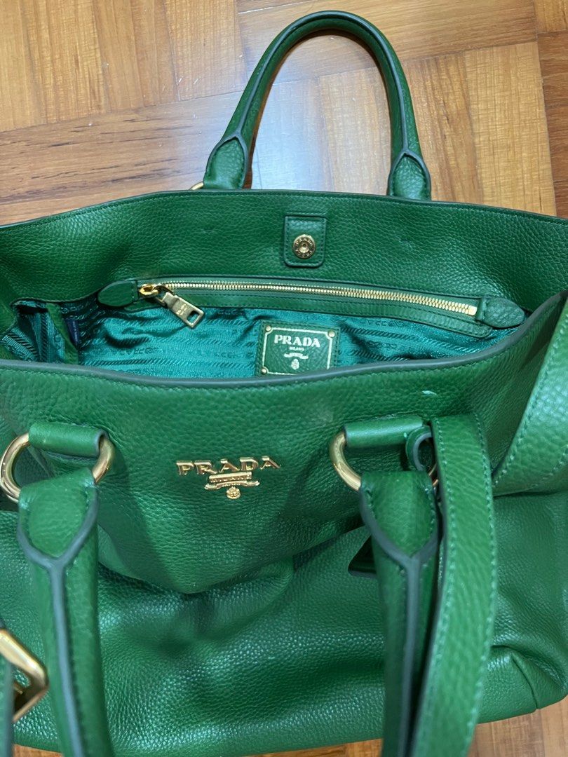 Prada Bag (Category: Bags & Wallets) located in Singapore. Submitted by Pinkflower88 (Listing ID 1237127315, Image 2). Description: Rarely use. Minor flaw at the front of the bag (see 4th pic), other than that bag condition is very new. Dust bag provided. Welcome to nego. .