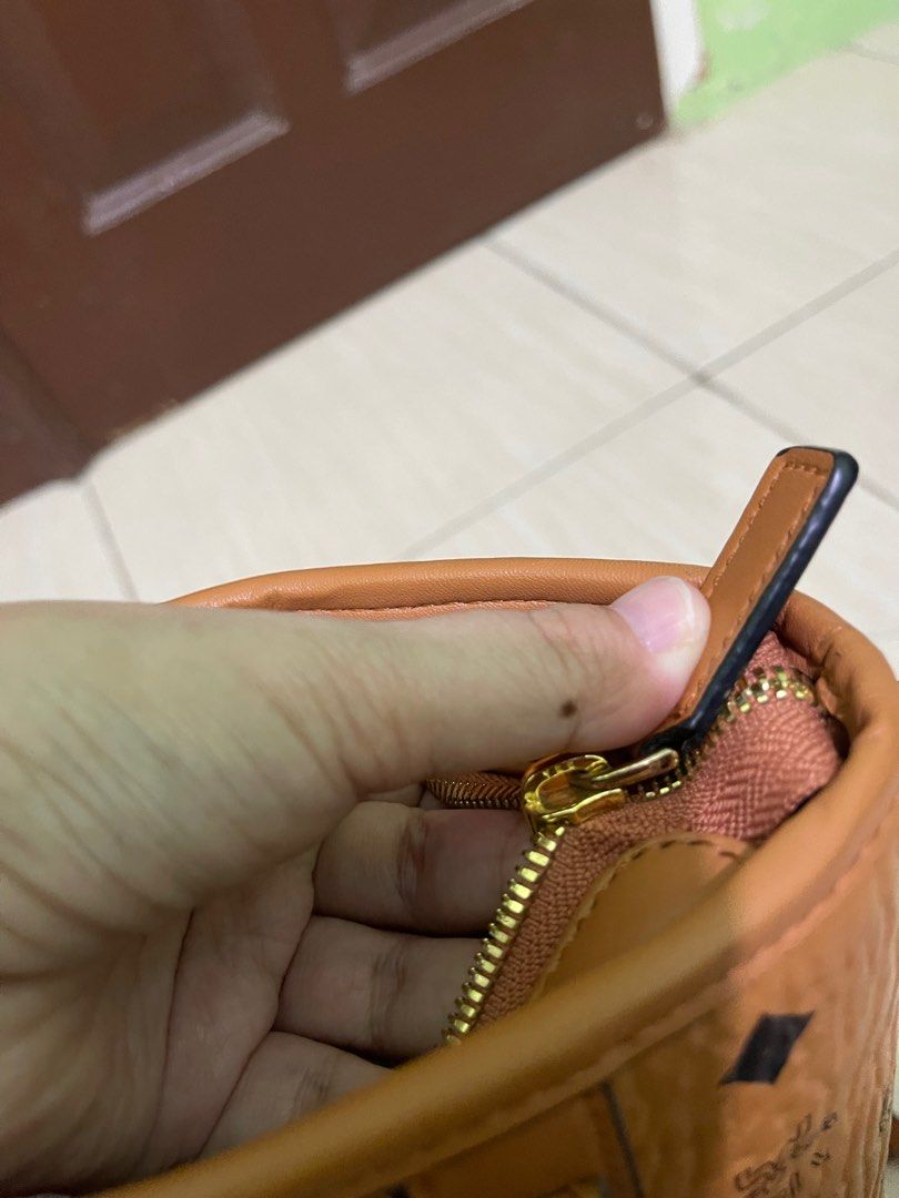 Mcm hotsell ykk zipper