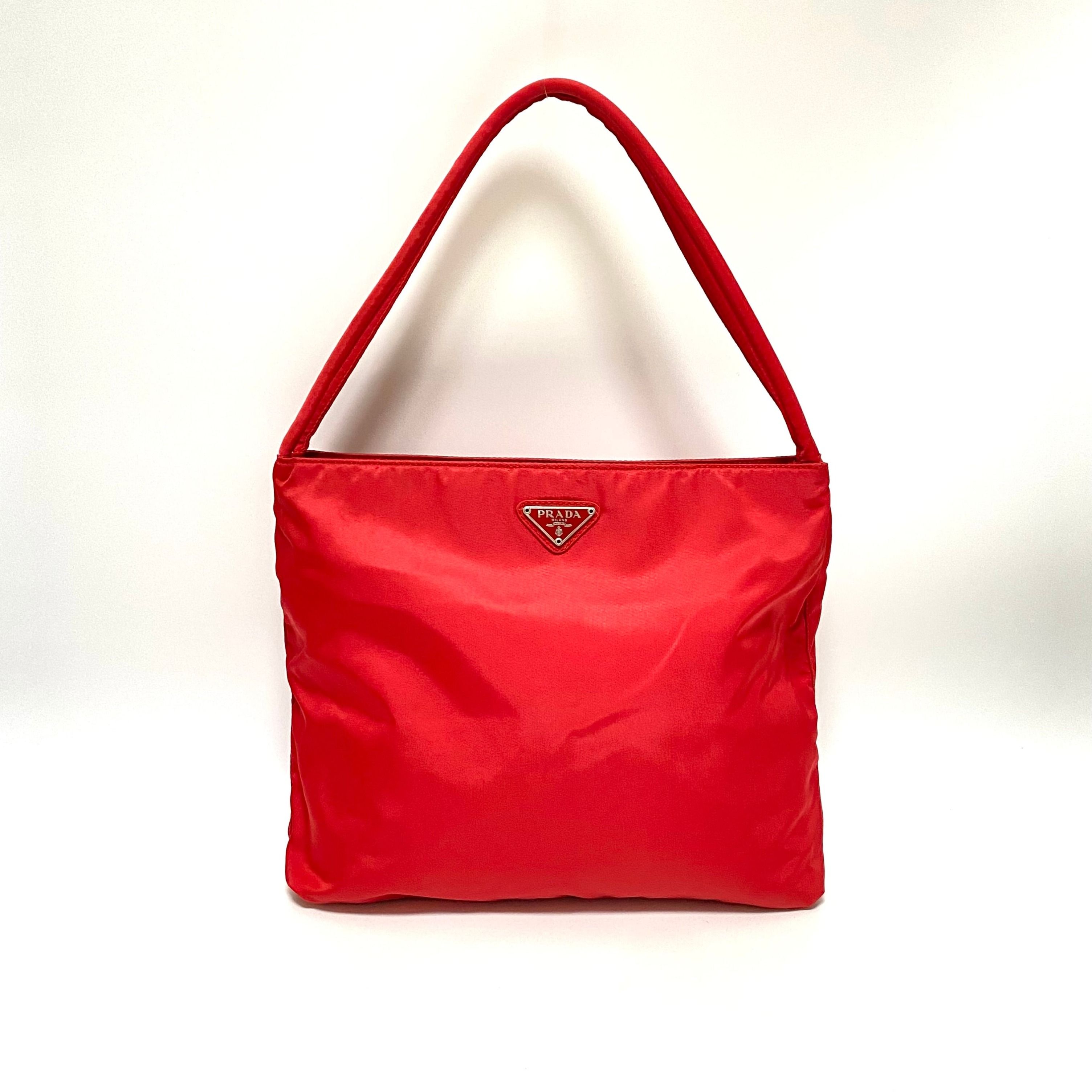 Vintage prada nylon large tote bag, Women's Fashion, Bags & Wallets,  Cross-body Bags on Carousell