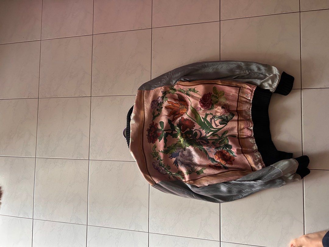Authentic Gucci Flower Jacket (Category: Coats, Jackets and Outerwear) located in Singapore. Submitted by random.page (Listing ID 1237166704, Image 2). Description: Flaws are shown in the pictures however those flaws are barely visible when wearing out 100% authentic Can nego or lowball tryna clear storage Meet up only .