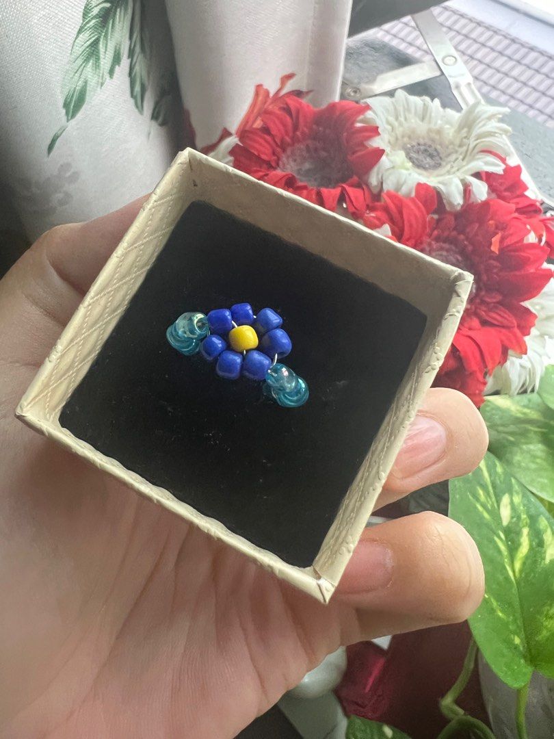 Blue flower beaded ring (Category: Rings) located in Kajang. Submitted by dclutterring (Listing ID 1237239201, Image 1). Description: Hi! I made this a while ago. It’s a beaded ring made with wire, of a blue flower. .