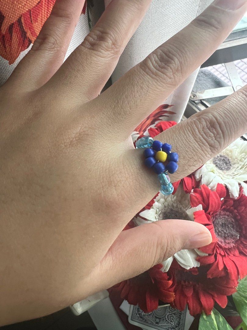 Blue flower beaded ring (Category: Rings) located in Kajang. Submitted by dclutterring (Listing ID 1237239201, Image 2). Description: Hi! I made this a while ago. It’s a beaded ring made with wire, of a blue flower. .