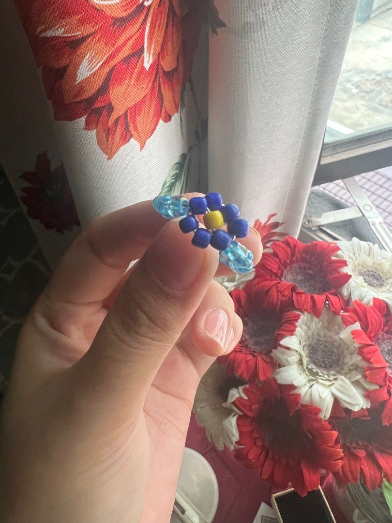 Blue flower beaded ring (Category: Rings) located in Kajang. Submitted by dclutterring (Listing ID 1237239201, Image 3). Description: Hi! I made this a while ago. It’s a beaded ring made with wire, of a blue flower. .
