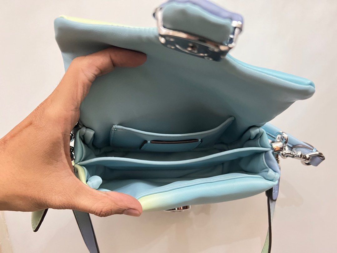 Coach (Category: Cross-body Bags) located in Kuala Lumpur. Submitted by danialfaris277 (Listing ID 1237333182, Image 3). Description: -rainbow colour -sling belt ✅.