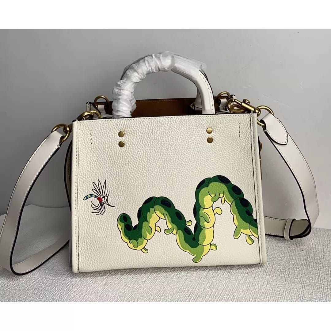 Disney x coach rogue 25 with patches best sale
