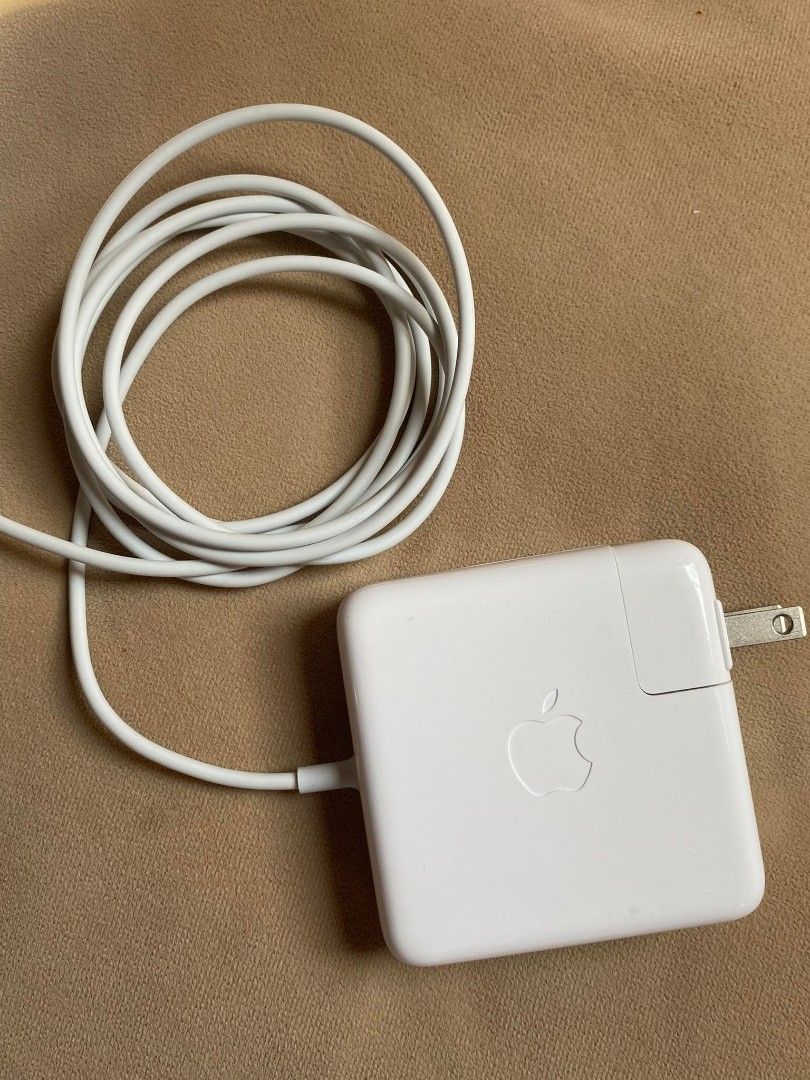 Genuine Apple Magsafe L 60w power adapter (Category: Chargers) located in Davao. Submitted by akvtOS (Listing ID 1237319623, Image 1). Description: Unused and like nee cond...