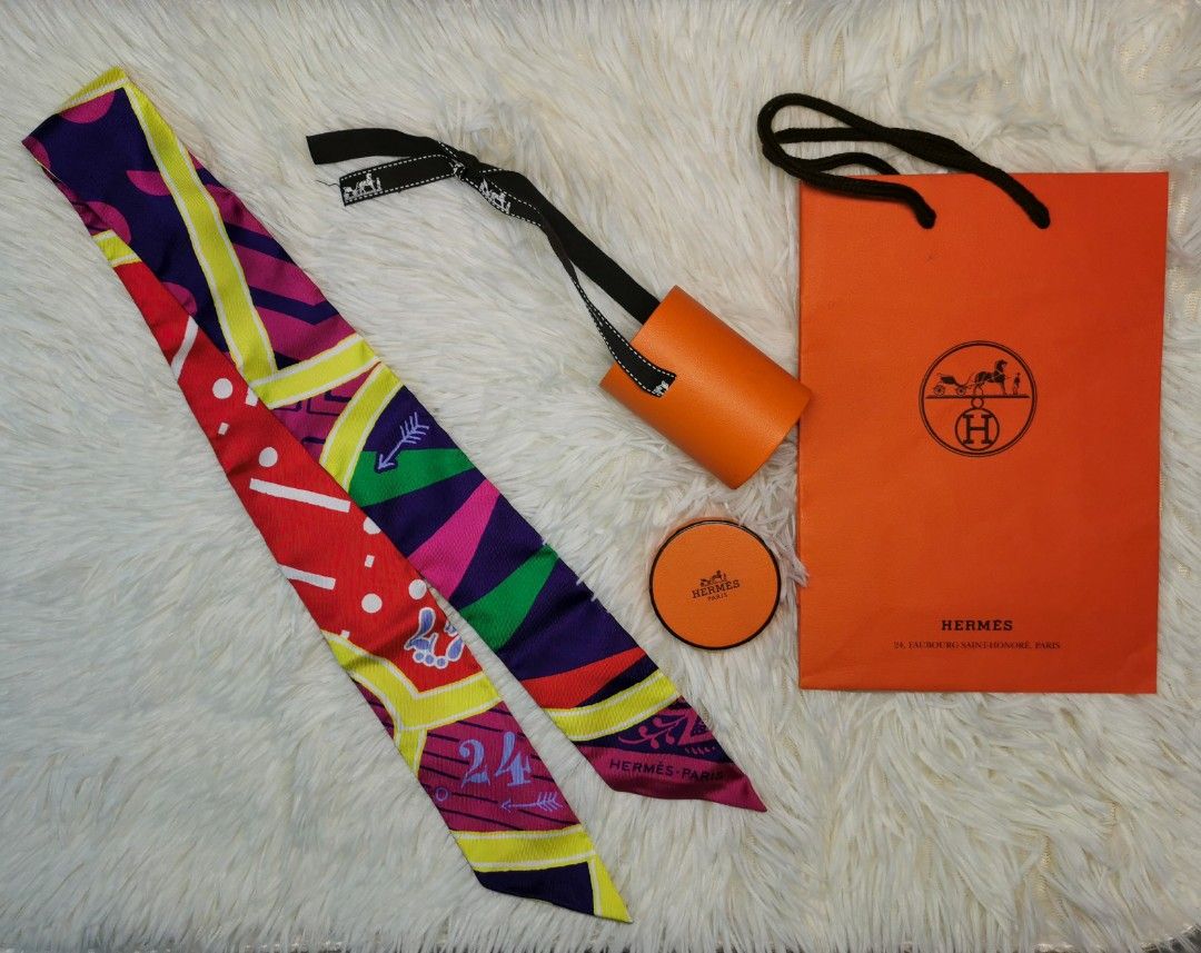 Hermes Twilly Fuchsia Scarf (Category: Luxury Accessories) located in Quezon City. Submitted by noahscartonlineshop (Listing ID 1237172691, Image 1). Description: Hermes Twilly Scarf Fuchsia P13,999 💯Original Scarf in red silk twill (100%) with details in yellow, green, fuchsia, purple and white. Brand new Condition , with Box and Paper Bag . Meet up: Trinoma Mall Quezon City COP nearest LBC Branch No Free Shipping.