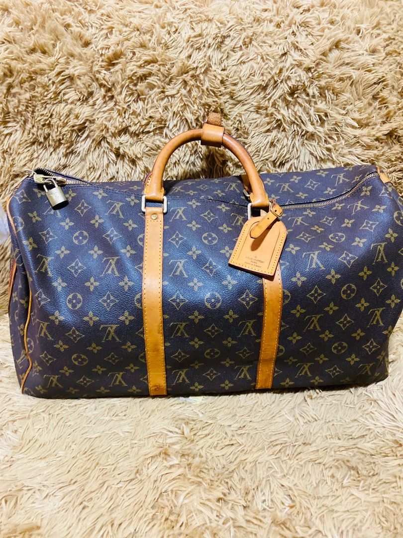 Sold at Auction: Louis Vuitton x Supreme Bandouliere 55 Keepall Travel Bag