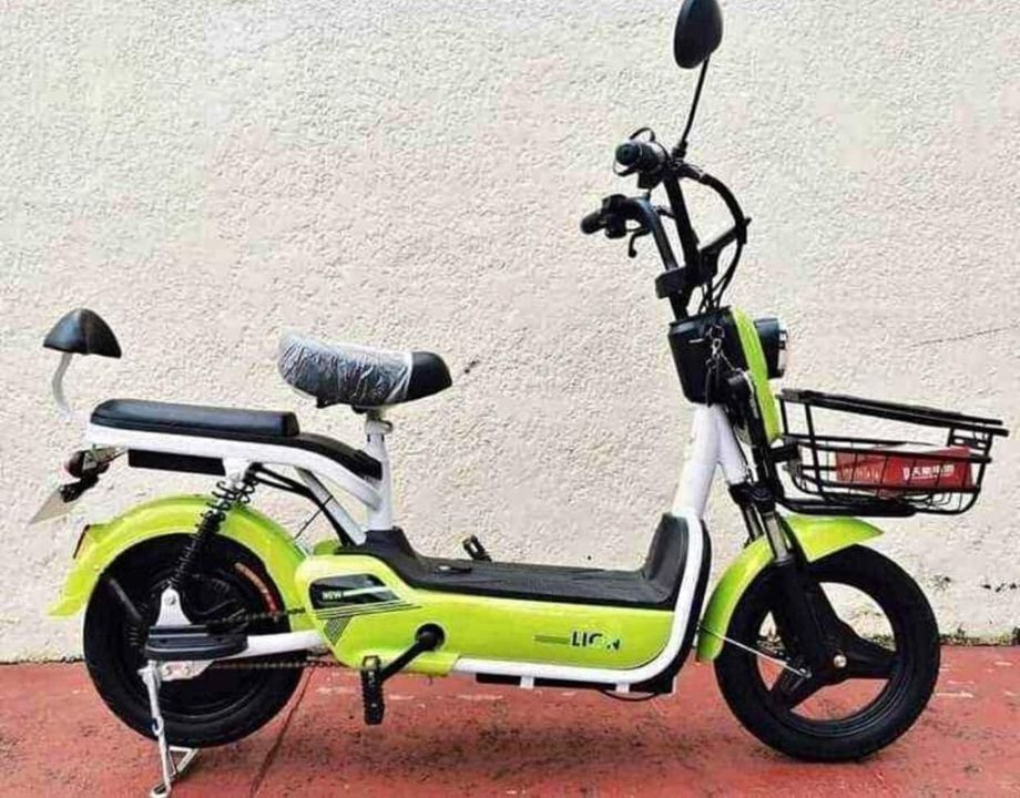 New E-Bike Double Wheels SALE (Category: Skates, Rollerblades & Scooters) located in Manila. Submitted by affordshopz (Listing ID 1237320371, Image 2). Description: Light 2 Wheels Electric Bike EBike (Electronic Bike) SALE Description: Rechargeable -Digital Gauge Panel (Speedometer, Battery, Signal light) -48V12Ah (SLA Battery) Removable -350 Watts Brushless Hub Motor -25-30 Km Range -30-40 Kph Speed -14"x2.50" Tubeless Tire -150kg Load capacity 
