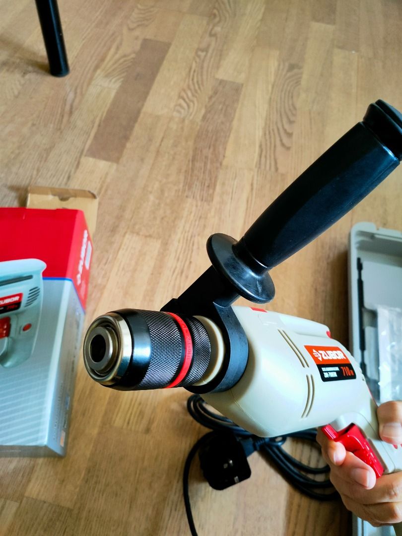 NEW German power wall impact hammer drill with antikickback side handle, AC power cord, depth