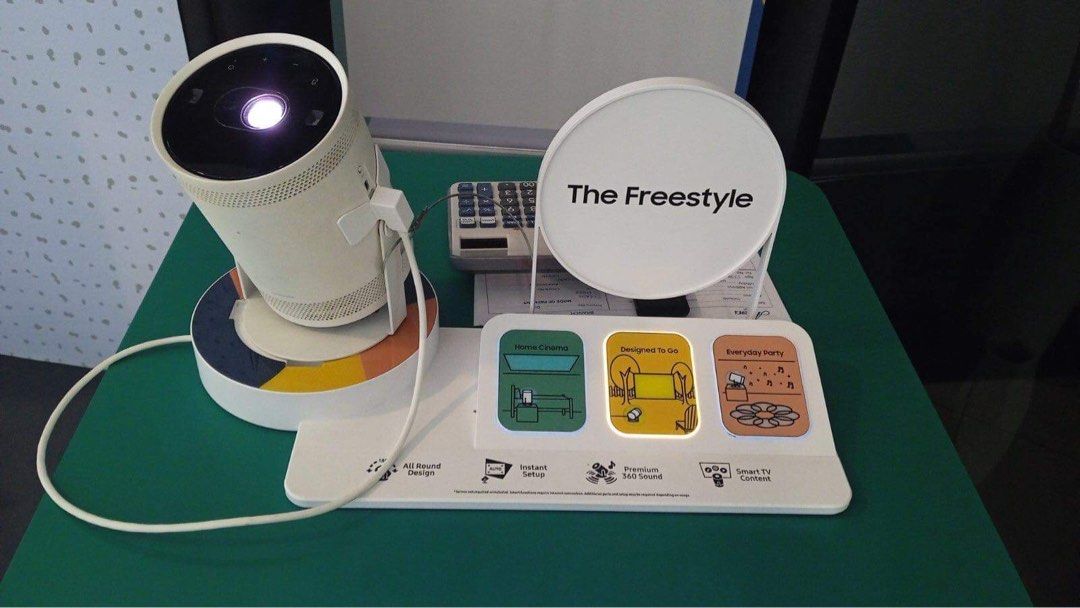 SAMSUNG FREESTYLE SMART PROJECTOR (Category: Projectors) located in Quezon City. Submitted by annys.online (Listing ID 1237314769, Image 2). Description: SAMSUNG FULL HD FREESTYLE SMART PROJECTOR * From unboxing to watching in a matter of minutes with Instant Setup * 100” Big Screen experience * Immerse yourself in the middle of the action with Premium 360˚Sound * Discover a world of entertainment with Smart TV Content MODEL SPLSP3BLAXXP SRP 54,9