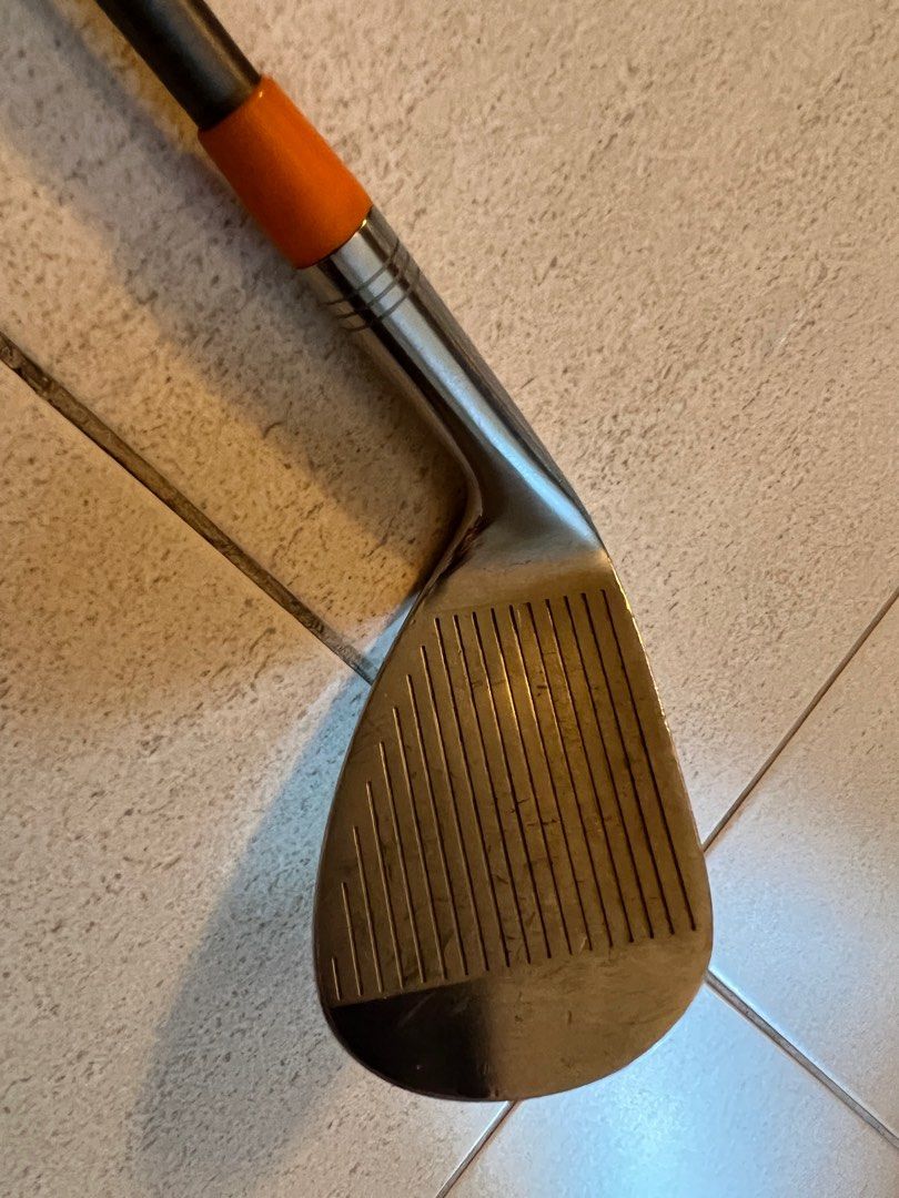 Sand Wedge (Category: Golf) located in Singapore. Submitted by bingpo (Listing ID 1237159964, Image 2). Description: Big Fish 56 Degrees sand wedge Golf pride grip ( blue and Orange) Steel fiber i70 shaft .