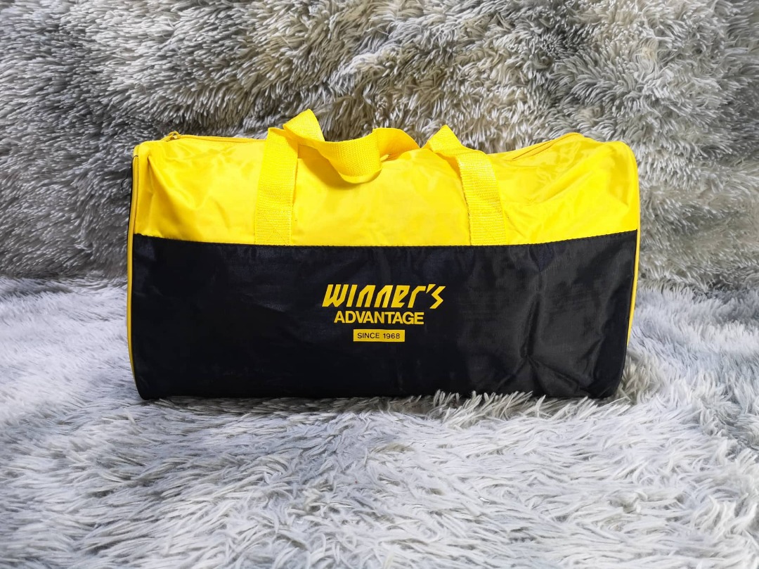 Winner;s Advantage Black & Yellow Duffle bag on Carousell
