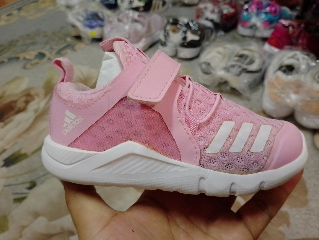 Pink adidas kids online shoes