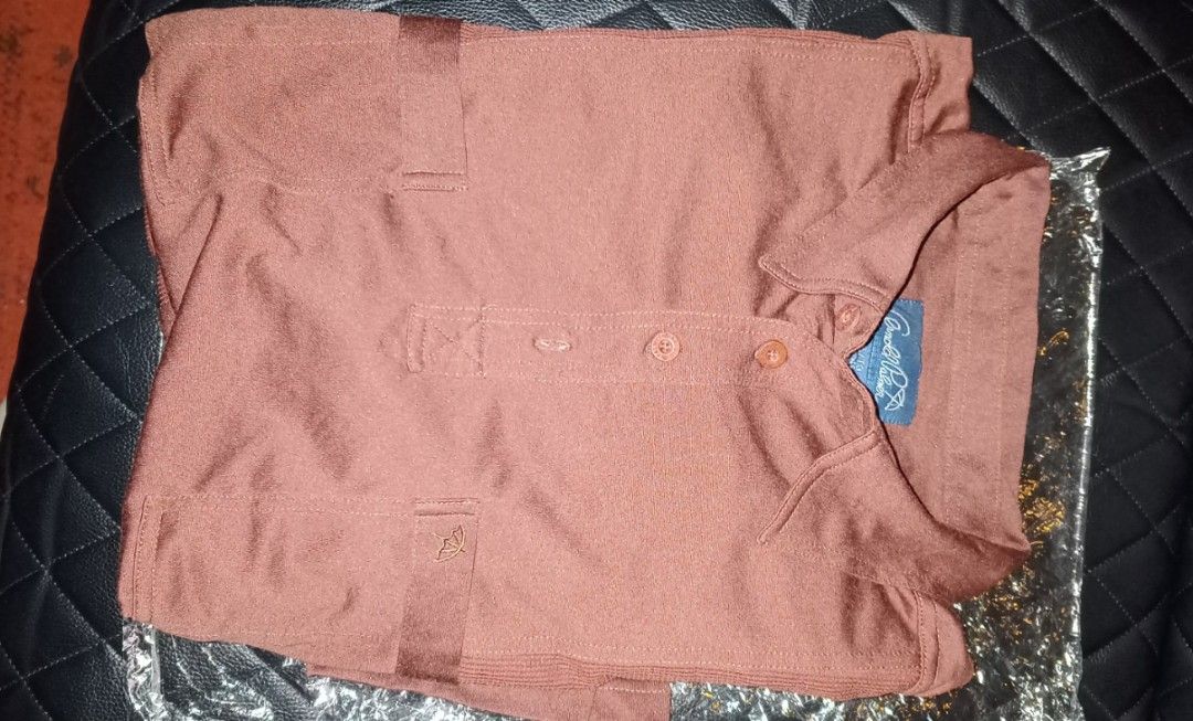 Arnold Palmer Golf shirt chocolate brown XL (Category: Activewear) located in Manila. Submitted by marcus42 (Listing ID 1237472128, Image 1). Description: Arnold Palmer Golf shirt chocolate brown XL American size.
