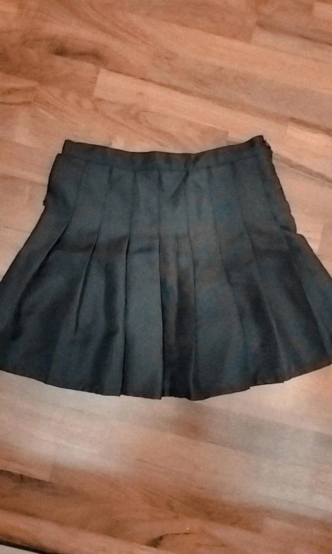 Black pleated tennis skirt with hidden shorts underneath skorts