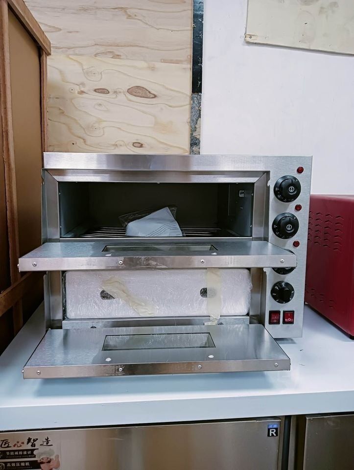 BRAND NEW PIZZA STONE OVEN DOUBLE DECK (Category: Ovens & Toasters) located in Makati City. Submitted by commercialappliances (Listing ID 1237350804, Image 3). Description: EPA-10 2 deck 2 trays electric oven Capacity: 220V, 50Hz/ 60Hz, 3000W Stainless steel electric oven Accessories: bake tray, bake rack Product Dimension (L x W x H) (cm) : 56x 56 x 44. Please message me directly! BRANDNEW!! WE ARE LEGIT SELLER FOR BUSINESS/HOUSEHOLD WE HAVE SHO