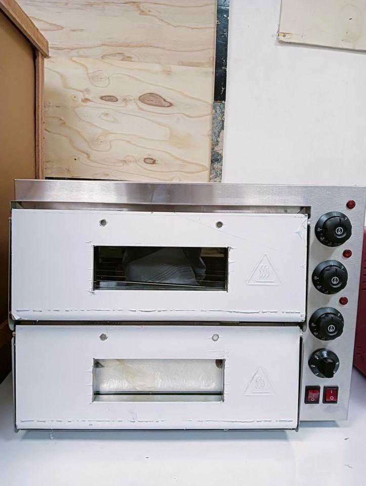 BRAND NEW PIZZA STONE OVEN DOUBLE DECK (Category: Ovens & Toasters) located in Makati City. Submitted by commercialappliances (Listing ID 1237350804, Image 1). Description: EPA-10 2 deck 2 trays electric oven Capacity: 220V, 50Hz/ 60Hz, 3000W Stainless steel electric oven Accessories: bake tray, bake rack Product Dimension (L x W x H) (cm) : 56x 56 x 44. Please message me directly! BRANDNEW!! WE ARE LEGIT SELLER FOR BUSINESS/HOUSEHOLD WE HAVE SHO