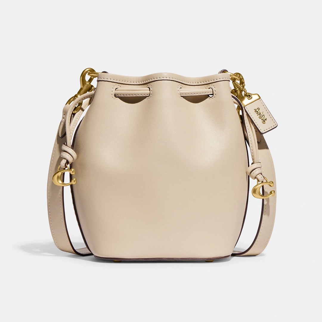 Coach Camila Bucket Bag - Brass Ivory, Luxury, Bags & Wallets on Carousell