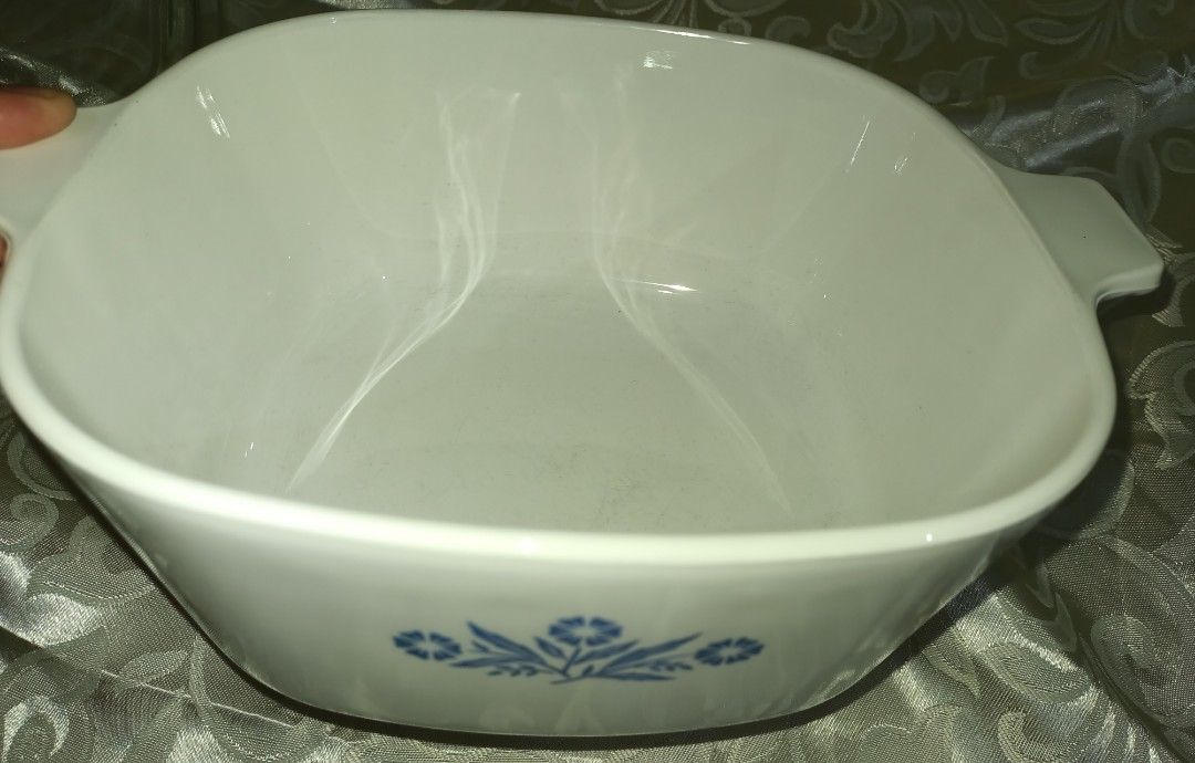 Corning Ware vintage made in USA (Category: Cookware & Accessories) located in San Jose del Monte. Submitted by eivon29 (Listing ID 1237489092, Image 2). Description: This vintage Corning Ware casserole baking dish in the classic Blue Cornflower pattern was part of the "A" series of Blue Cornflower made by Corning between 1973 and 1994. It comes with a glass lid marked C-24. The casserole is in very good condition with no chips or cracks and only