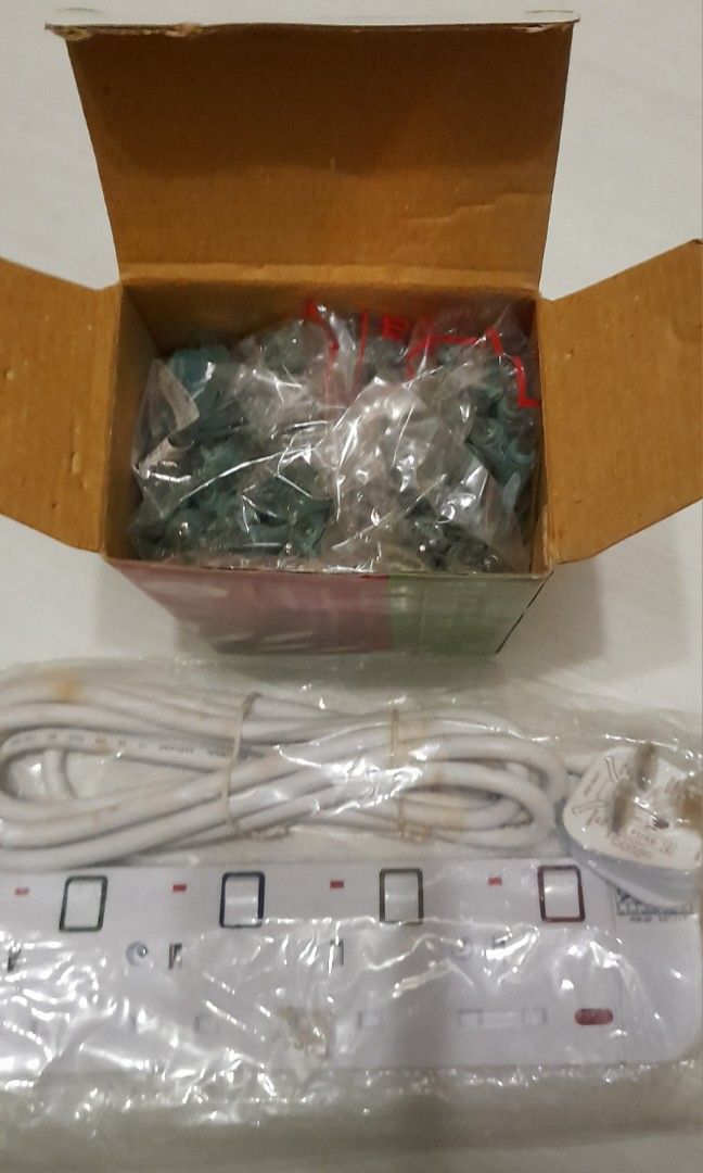 Extension Socket (Category: Electrical, Adaptors & Sockets) located in Singapore. Submitted by faithfullyours (Listing ID 1237240333, Image 6). Description: For individual purchase:- Extension cord /socket - 4 plugs $11 - X'mas Lightings x1 $2 Pls note the white material covering long wires have discoloured (turned brown) even inside packet. That's why selling cheap. Get all for $13 ONLY!! Kept brand new for too long but never used. Cash & carry 