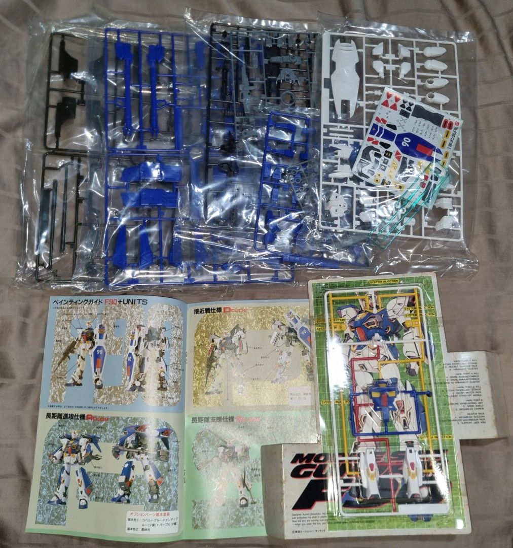 F90 Gundam 1/100 (Category: Gundam Model Kits) located in Singapore. Submitted by gsamrak (Listing ID 1237510138, Image 3). Description: Different range of weapon type all-in-one.
